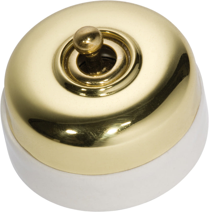 TRADCO IVORY PORCELAIN BASE SWITCH POLISHED BRASS