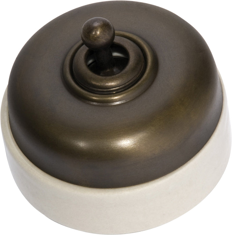 TRADCO IVORY PORCELAIN BASE SWITCH POLISHED BRASS